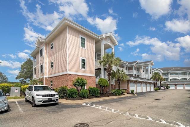 4847 Carnation Cir Unit 201, Myrtle Beach, SC 29577 - view of building exterior with community garages