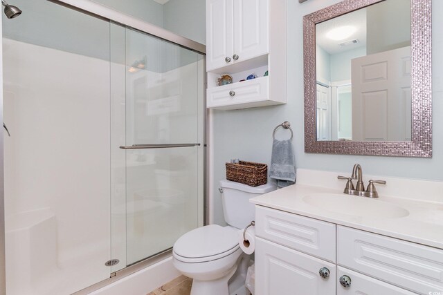 4847 Carnation Cir Unit 201, Myrtle Beach, SC 29577 - bathroom with vanity, a shower stall, toilet, and visible vents