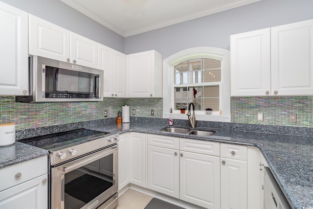 4847 Carnation Cir Unit 201, Myrtle Beach, SC 29577 - kitchen featuring a sink, appliances with stainless steel finishes, ornamental molding, and white cabinetry