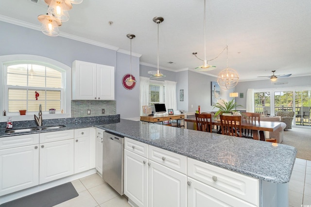 4847 Carnation Cir Unit 201, Myrtle Beach, SC 29577 - kitchen with a peninsula, open floor plan, light tile patterned floors, a sink, and dishwasher