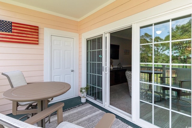 balcony with outdoor dining area