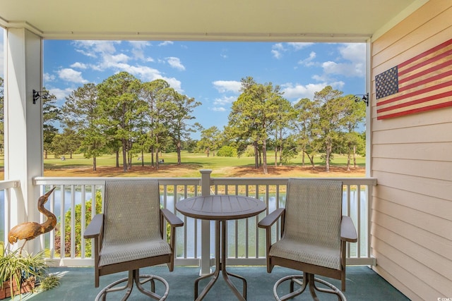 balcony featuring golf course view