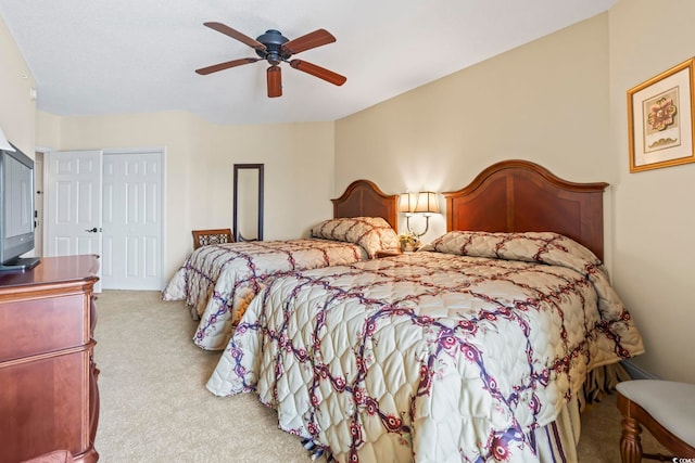 bedroom featuring carpet floors and ceiling fan