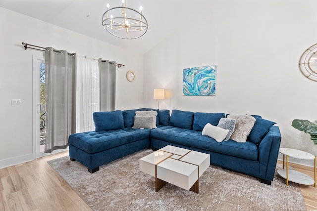 6253 Catalina Dr Unit 1533, North Myrtle Beach, SC 29582 - living room with wood finished floors, a chandelier, high vaulted ceiling, and baseboards