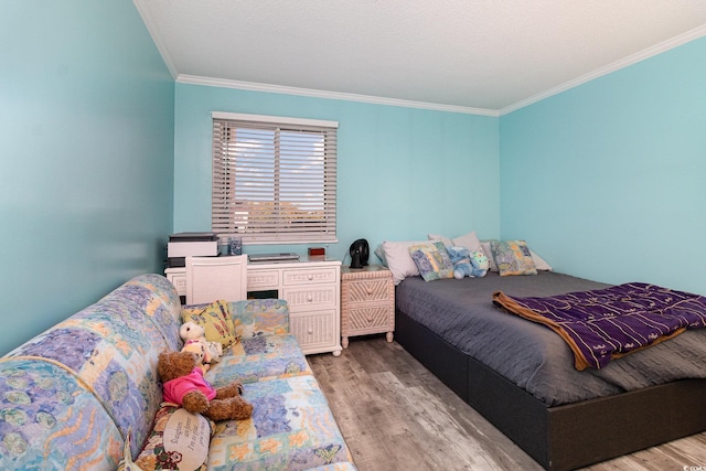2507 S Ocean Blvd Unit 403, North Myrtle Beach, SC 29582 - bedroom featuring crown molding and wood finished floors
