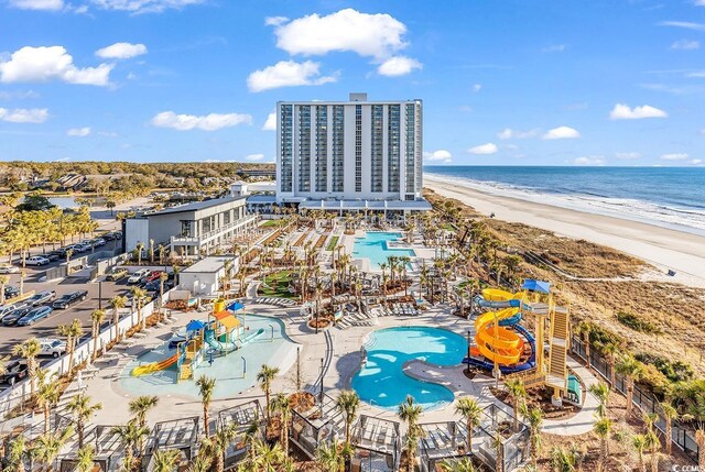 9994 Beach Club Dr Unit 2403, Myrtle Beach, SC 29572 - drone / aerial view of a pool area and expansive beach