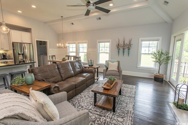 living area with independent washer and dryer, lofted ceiling with beams, ceiling fan with notable chandelier, visible vents, and dark wood-style floors