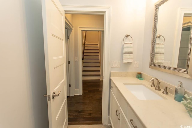 bathroom featuring vanity and wood finished floors