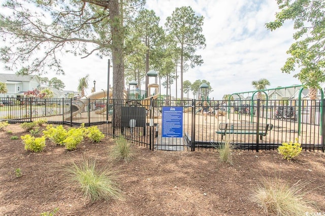 exterior space featuring fence and playground community
