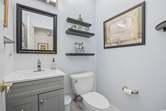 9628 Indigo Creek Blvd, Murrells Inlet, SC 29576 - bathroom with toilet, baseboards, and vanity