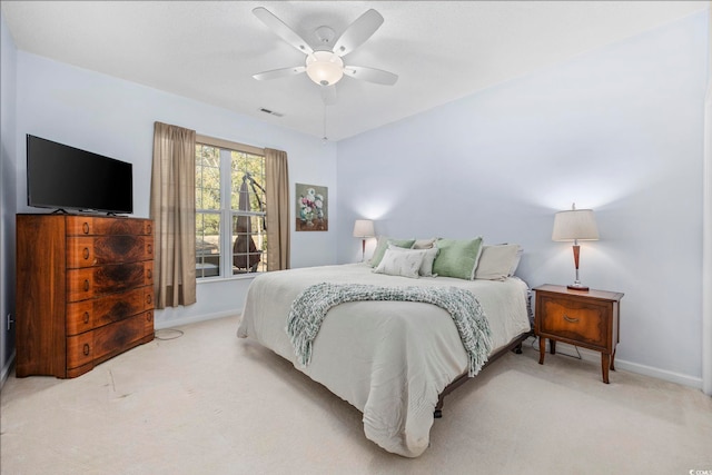 9628 Indigo Creek Blvd, Murrells Inlet, SC 29576 - bedroom with a ceiling fan, baseboards, light colored carpet, and visible vents