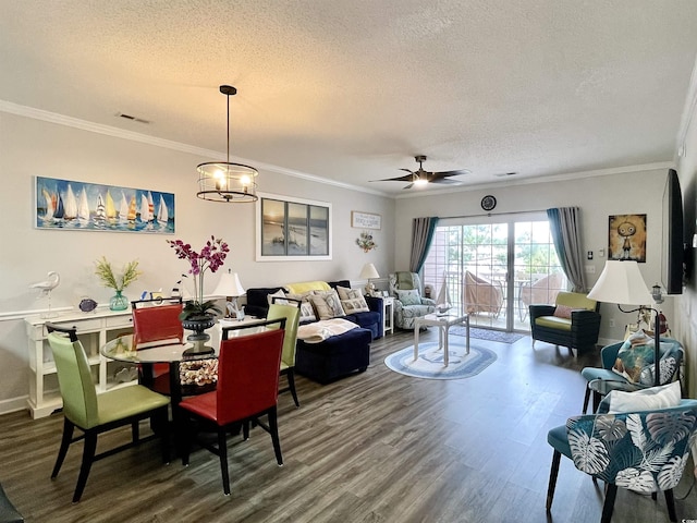 3979 Forsythia Ct Unit 203, Myrtle Beach, SC 29588 - dining space featuring a textured ceiling, wood finished floors, crown molding, ceiling fan, and baseboards