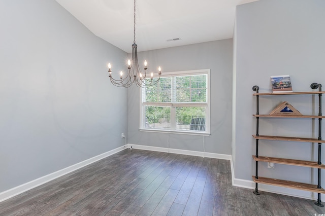 5581 Plantersville Pl, Myrtle Beach, SC 29579 - empty room with a chandelier, dark wood finished floors, and baseboards