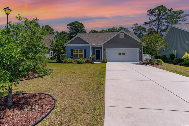 5581 Plantersville Pl, Myrtle Beach, SC 29579 - view of front of house with driveway, a yard, and a garage