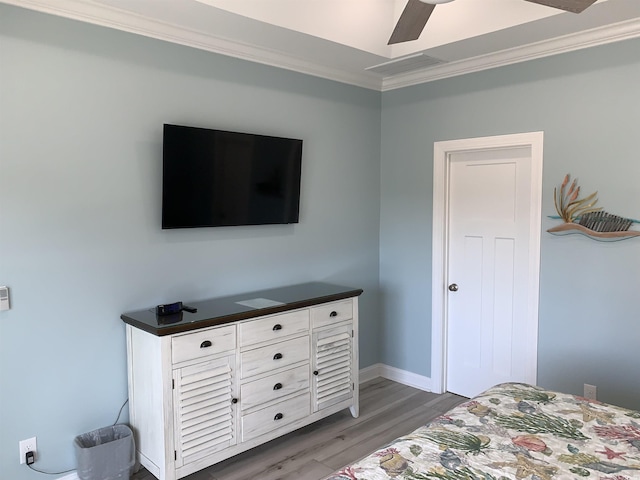 928STRANDAVE Strand Ave, North Myrtle Beach, SC 29582 - bedroom featuring a ceiling fan, baseboards, ornamental molding, and wood finished floors
