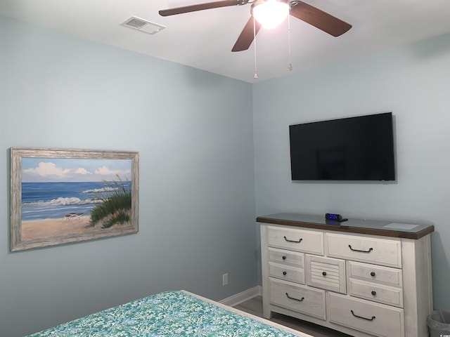 928STRANDAVE Strand Ave, North Myrtle Beach, SC 29582 - bedroom with a ceiling fan, baseboards, and visible vents