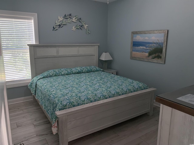 928STRANDAVE Strand Ave, North Myrtle Beach, SC 29582 - bedroom featuring baseboards and wood finished floors