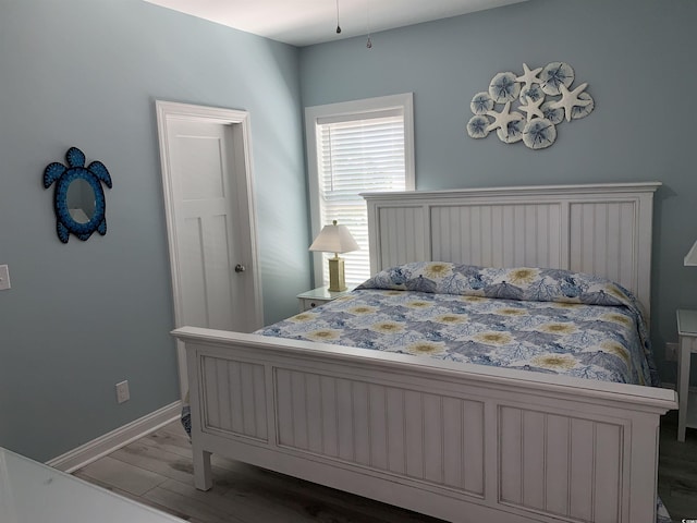 928STRANDAVE Strand Ave, North Myrtle Beach, SC 29582 - bedroom featuring baseboards and wood finished floors