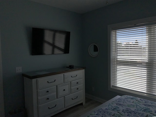 928STRANDAVE Strand Ave, North Myrtle Beach, SC 29582 - bedroom featuring baseboards and wood finished floors
