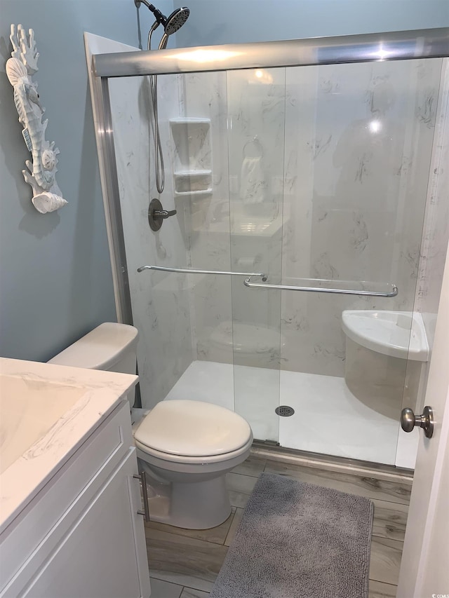 928STRANDAVE Strand Ave, North Myrtle Beach, SC 29582 - bathroom with vanity, toilet, and a shower stall