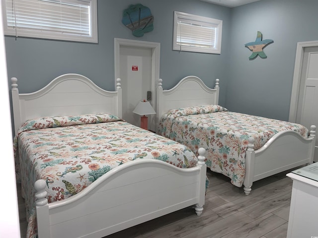 928STRANDAVE Strand Ave, North Myrtle Beach, SC 29582 - bedroom with wood finished floors