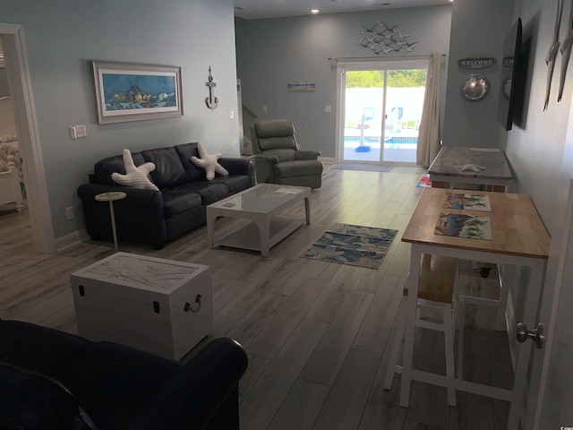928STRANDAVE Strand Ave, North Myrtle Beach, SC 29582 - living room featuring baseboards and wood finished floors