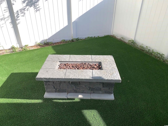 928STRANDAVE Strand Ave, North Myrtle Beach, SC 29582 - view of yard featuring an outdoor fire pit