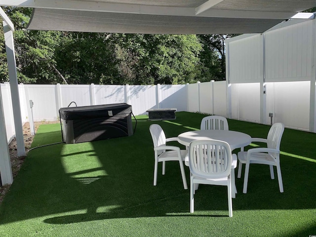 928STRANDAVE Strand Ave, North Myrtle Beach, SC 29582 - view of patio / terrace with outdoor dining area and a fenced backyard