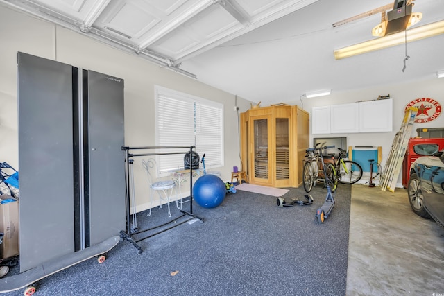 exercise room with a garage