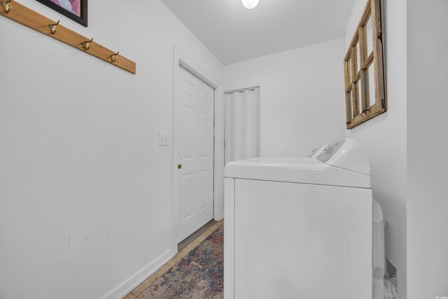 4104 Friendfield Trce, Little River, SC 29566 - washroom with washing machine and dryer and baseboards