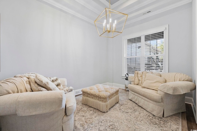 living area with crown molding, baseboards, visible vents, and a notable chandelier