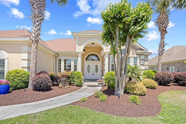 view of front of home with stucco siding