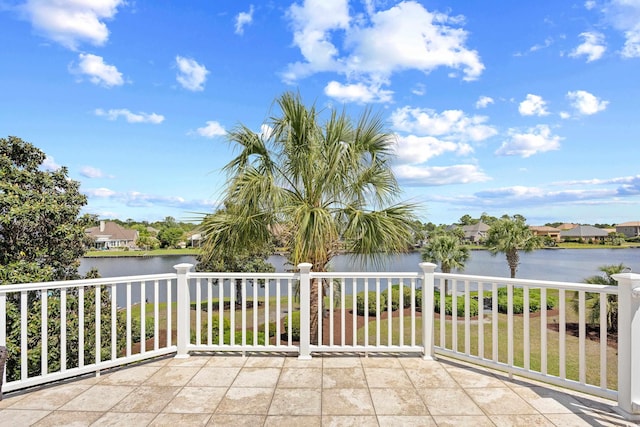 view of patio featuring a water view