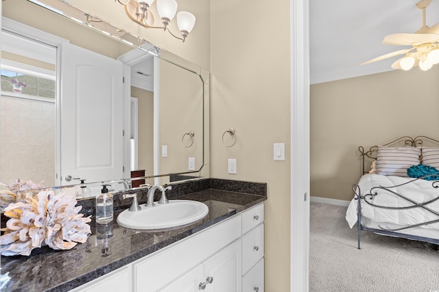 bathroom with vanity, a ceiling fan, and crown molding
