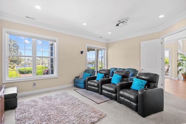 living area with crown molding, baseboards, recessed lighting, and visible vents
