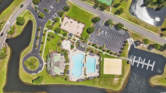 bird's eye view with a water view