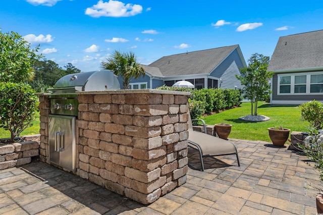 view of patio with exterior kitchen