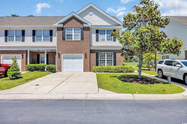 260 Connemara Dr Unit E, Myrtle Beach, SC 29579 - view of property with concrete driveway, brick siding, and a garage