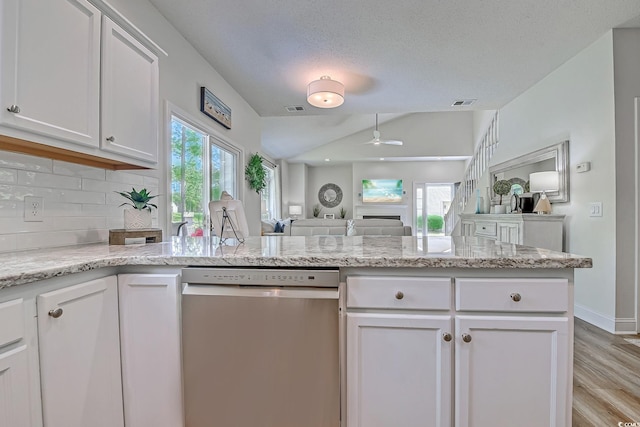 104-4 Gully Branch Ln Unit 4, Myrtle Beach, SC 29572 - kitchen featuring stainless steel dishwasher, ceiling fan, light wood-type flooring, decorative backsplash, and white cabinetry