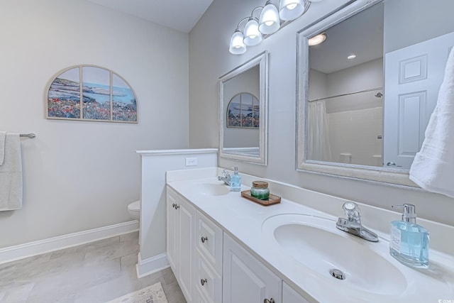 104-4 Gully Branch Ln Unit 4, Myrtle Beach, SC 29572 - bathroom with toilet, double vanity, baseboards, and a shower with shower curtain