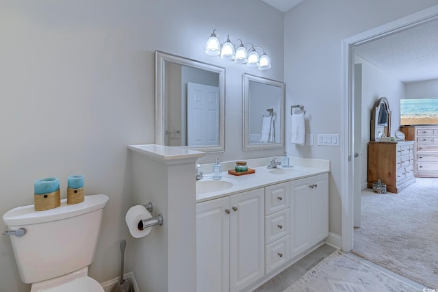 104-4 Gully Branch Ln Unit 4, Myrtle Beach, SC 29572 - bathroom featuring toilet, baseboards, and double vanity