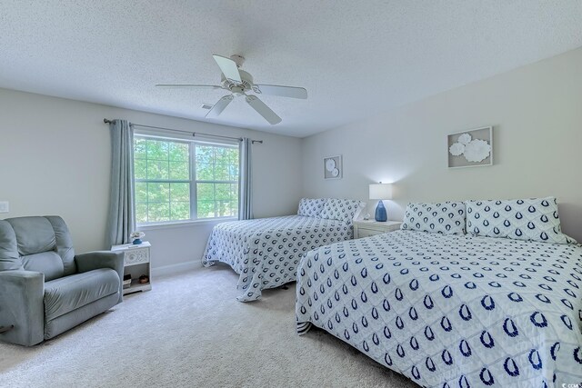 104-4 Gully Branch Ln Unit 4, Myrtle Beach, SC 29572 - bedroom with carpet flooring, a textured ceiling, and ceiling fan
