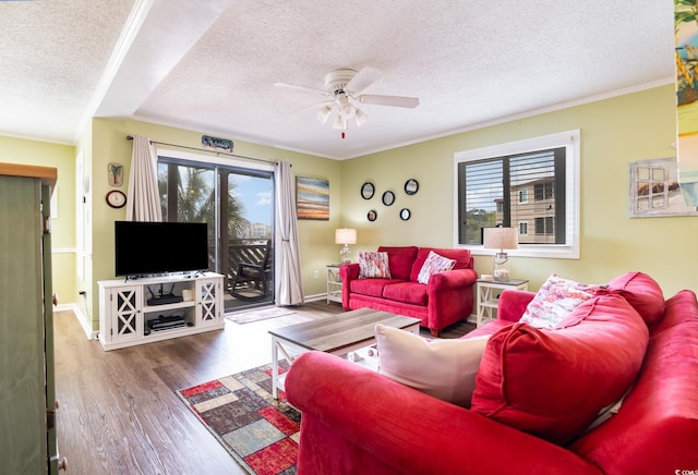 609 Hillside Dr S Unit C-10, North Myrtle Beach, SC 29582 - living area featuring a textured ceiling, a ceiling fan, wood finished floors, and ornamental molding