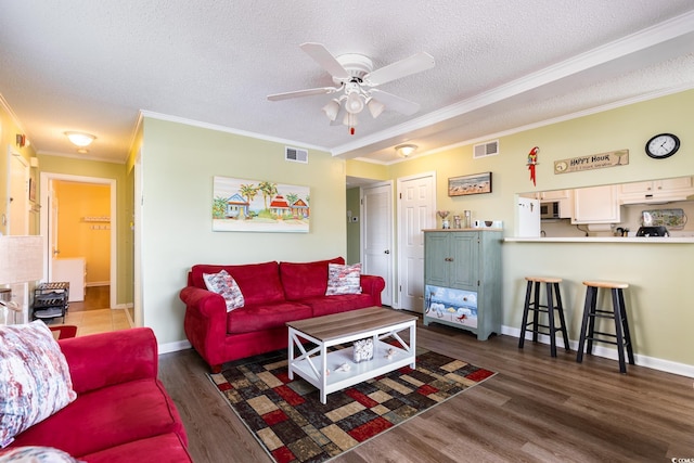 609 Hillside Dr S Unit C-10, North Myrtle Beach, SC 29582 - living room featuring a textured ceiling, crown molding, ceiling fan, and wood finished floors
