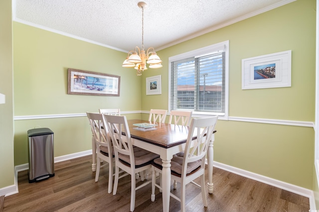 609 Hillside Dr S Unit C-10, North Myrtle Beach, SC 29582 - dining space with a chandelier, wood finished floors, a textured ceiling, and ornamental molding