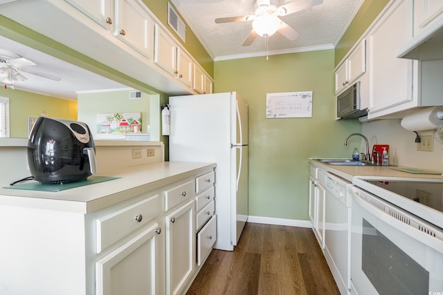 609 Hillside Dr S Unit C-10, North Myrtle Beach, SC 29582 - kitchen featuring ceiling fan, white appliances, dark wood-style floors, crown molding, and light countertops