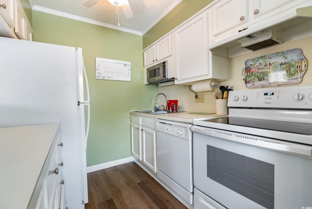 609 Hillside Dr S Unit C-10, North Myrtle Beach, SC 29582 - kitchen featuring white appliances, white cabinets, dark wood-style floors, light countertops, and crown molding