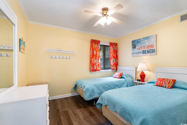 609 Hillside Dr S Unit C-10, North Myrtle Beach, SC 29582 - bedroom with dark wood-type flooring, crown molding, a textured ceiling, and a ceiling fan