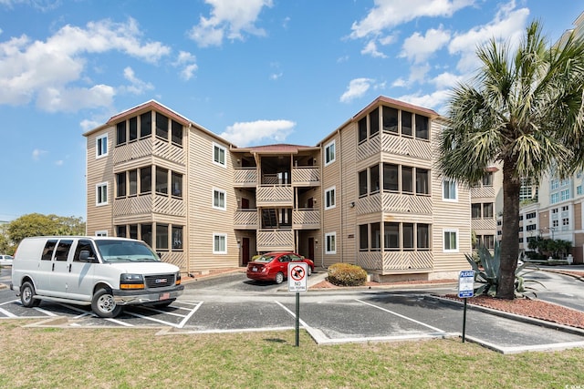 609 Hillside Dr S Unit C-10, North Myrtle Beach, SC 29582 - view of apartment building / complex featuring uncovered parking