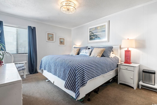 carpeted bedroom with ornamental molding and a textured ceiling